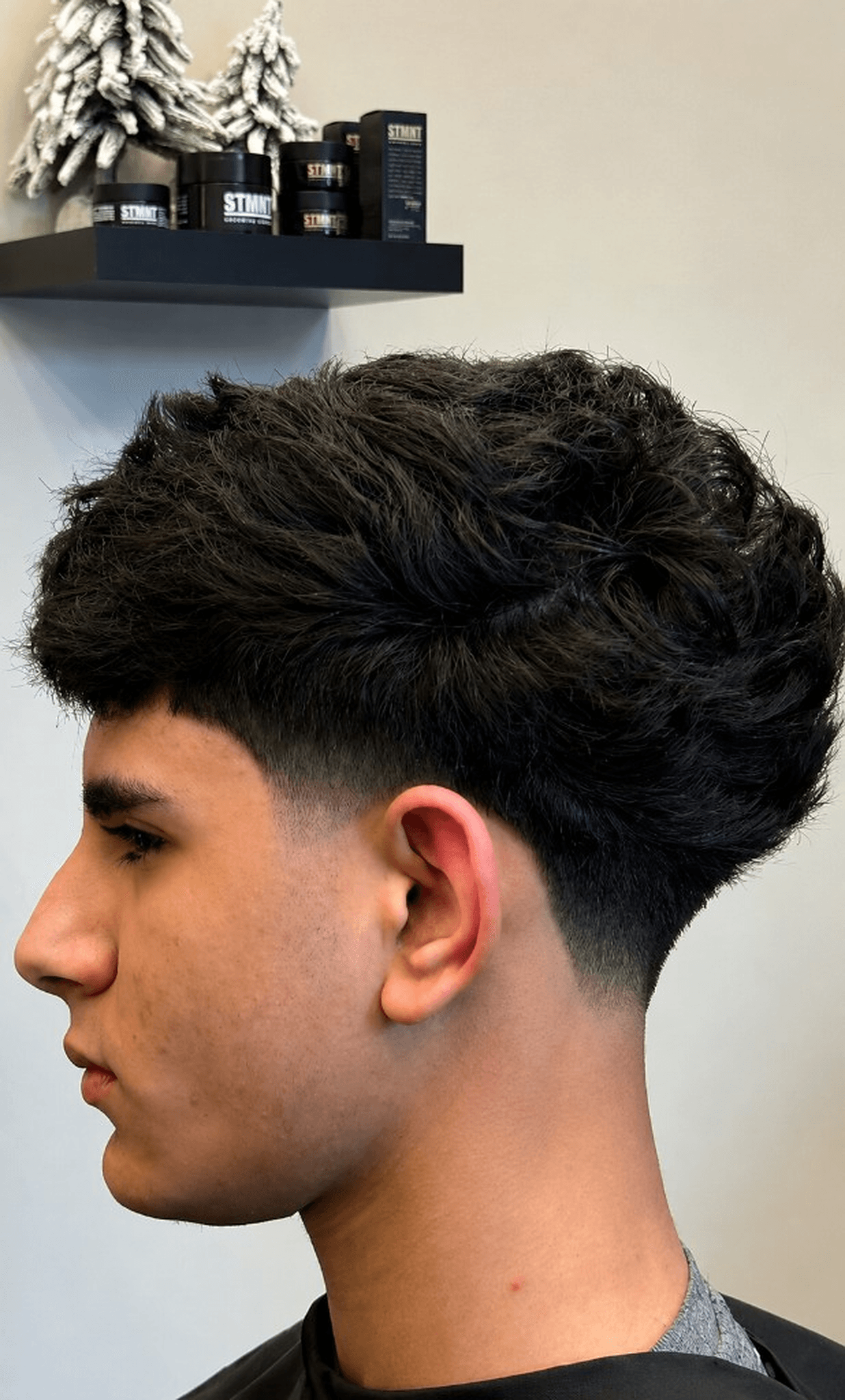 Side profile of a textured taper fade