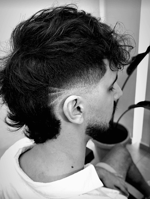 Finished haircut with clean fade detail